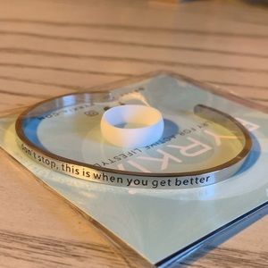 PYRKIÄ stackable cuff and white silicone ring